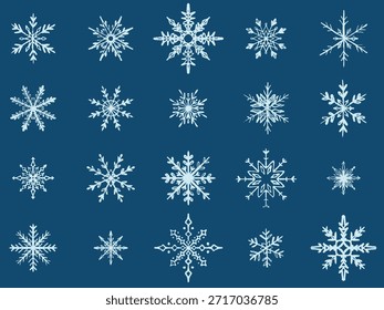 Conjunto de copo de nieve azul dibujado a mano. Ilustración de boceto de Vector en estilo vintage de carbón de crayón. Patrones únicos de copos de nieve para el invierno, las vacaciones y el diseño estacional. Decoración de Navidad