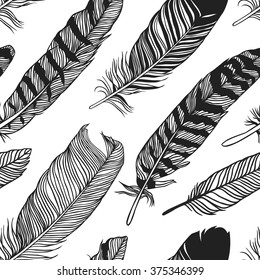 Hand drawn Bohemian chic style illustration. Ink vector Seamless pattern with Boho Feathers. Creative black contour art-work