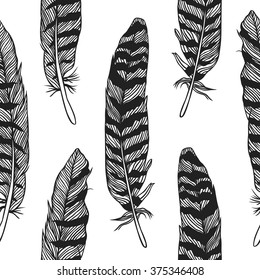 Hand drawn Bohemian chic style illustration. Ink vector Seamless pattern with Boho Feathers. Creative black contour art-work