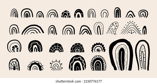 Hand drawn boho rainbow clipart collection. Magic rainbow silhouette in sketch doodle style. Cartoon vector isolated illustration