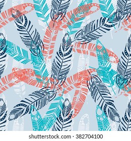 Hand drawn boho style seamless pattern. Sketched feathers. Trendy indigo,boho,ethnic design. Seamless background for textile,wrapping,wallpaper,cloth and home decor. Romantic summer template.