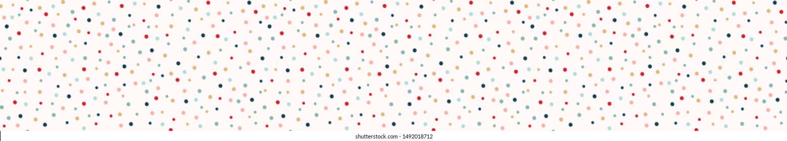 Hand drawn border with tiny tossed polka dot confetti. Seamless horizontal edging trim. Traditional red green holiday ribbon texture. Vector washi tape