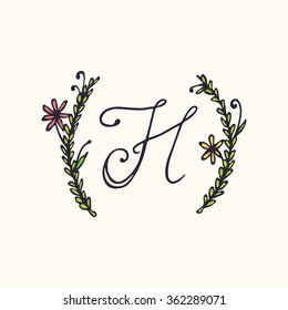 Hand drawn botanical monogram with H character in floral wreath made in vector. 