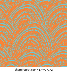 Hand drawn bright seamless ornament in tribal style. Endless orange ethnic texture