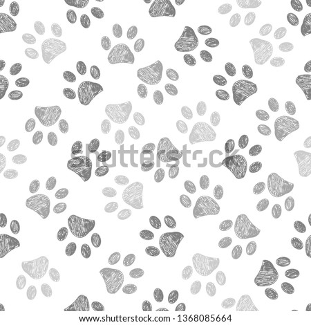 Hand drawn brown and black colored paw prints. Foot prints background