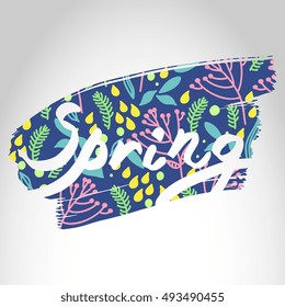 Hand drawn brush ink lettering word "Spring"with abstract background