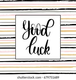 Hand drawn brush lettering "Good luck" on  pattern. Inspirational quote handwritten with black ink, perfect for posters, t-shirts and cards Vector illustration