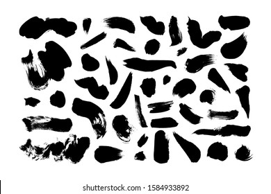 Hand drawn brush spots, dots and lines vector set. Black paint, ink brush strokes, spots, circles. Grunge smears collection isolated on white. Abstract ink dry strokes doodle textures. Freehand dots. 