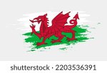 Hand drawn brush stroke flag of Wales. Creative national day hand painted brush illustration on white background