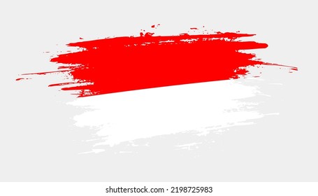 Bandera de derrame de pincel dibujado a mano de Indonesia. Ilustración creativa de pincel pintado con la mano del día en el fondo blanco