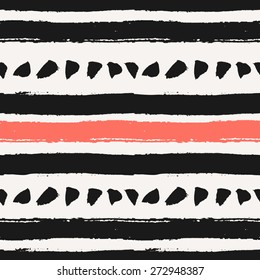 Hand drawn brush strokes seamless pattern. Abstract hand painted repeat texture in black and coral red.