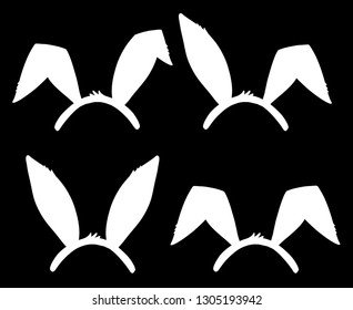 Hand drawn bunny ears silhouette vector illustration. Easter holiday design elements set in white isolated over black.