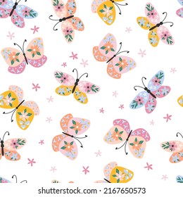 Hand drawn butterflies decorated with flowers seamless pattern on a white background. Summer natural background and texture for printing on fabrics and paper. Vector Illustration. 