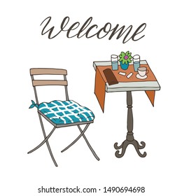 Hand drawn cafe table with hand lettering - welcome