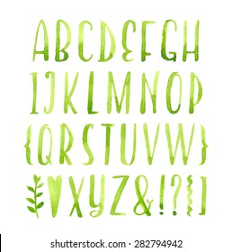 Hand drawn calligraphic green watercolor font.