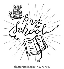 Hand drawn Calligraphic inscription Back To School Background On Chalkboard With Owl and book. Illustration of education as back to school banner, knowledge design elements on white background
