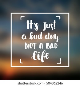 Hand drawn calligraphy. Template post card. concept handwritten motivation "it`s just a bad day not a bad life"