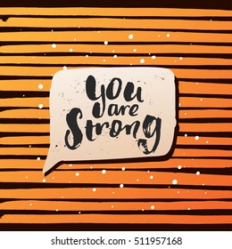 Hand drawn calligraphy. Template post card. concept handwritten motivation " you are strong "  