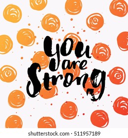 Hand drawn calligraphy. Template post card. concept handwritten motivation " you are strong "  