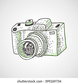 Hand drawn camera with green shadows. Sketch style