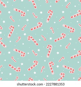 Hand drawn candy cane seamless pattern on teal background