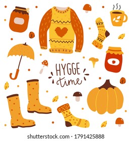 Hand drawn cartoon set of autumn icons: socks, sweater, falling leaves,  cup with hot drink, jam, pumpkin, mushrooms. Doodle collection of fall season elements.  Vector Autumn greeting card