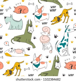 Hand drawn cartoon style dogs. Colored vector seamless pattern