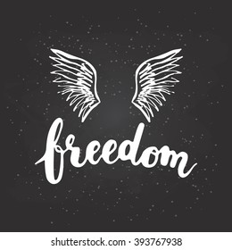 Hand drawn chalk typography lettering phrase Freedom with birds wings on the black chalkboard background. Modern motivational calligraphy for typography poster and postcard or t-shirt print.