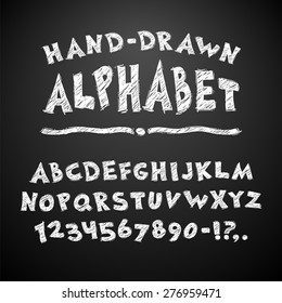 Hand Drawn Chalked Alphabet on Blackboard Background.