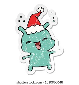 hand drawn christmas distressed sticker cartoon of kawaii alien