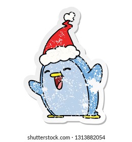 hand drawn christmas distressed sticker cartoon of kawaii penguin