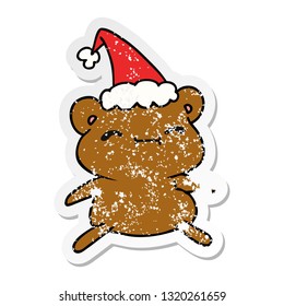 hand drawn christmas distressed sticker cartoon of kawaii bear