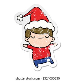 hand drawn christmas distressed sticker cartoon of kawaii boy