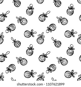 Hand drawn Christmas seamless vector pattern. Winter ornament for wrapping paper and fabric with Christmas toys in black and white colors.