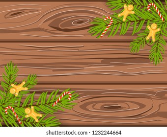 Hand drawn Christmas vector background, brown wooden texture with chritmas tree branches, candy canes and gingerbread men
