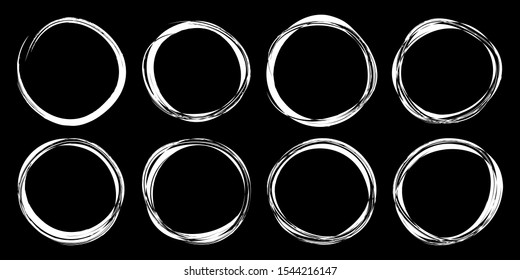 Hand drawn circles sketch frame set. Rounds scribble line circles. Doodle circular white logo design elements isolated on black background.  Vector illustrations.