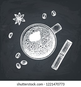 Hand drawn coffee cup. Top view illustration on white background. Vintage hot drink, chocolate, anise star and coffee beans sketches. Vector card or invitation design on chalkboard