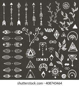 Hand drawn collection of tribal, floral and ethnic decorative elements. Hand sketched elements, strokes, arrows, branches, flowers and geometric symbols. Vector illustration isolated on background