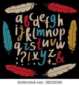 Hand drawn colorful alphabet, font, letters, feathers on chalkboard, blackboard background 