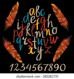 Hand drawn colorful brush whiting alphabet, font, letters, numbers, watercolor feathers on chalkboard, blackboard background 