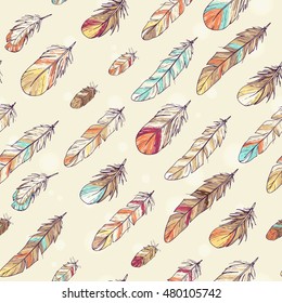 hand drawn colorful feathers in seamless pattern; sketch style background; boho chic, hippie, hipster ornament with brown, beige, white, yellow, turquise and red colors; for wrapping, textile, posters