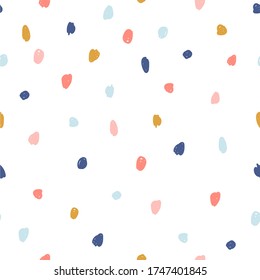 Hand drawn colorful polka dot texture. Modern Scandinavian graphic tileable print design for birthday poster, card, textile, wrapping paper, wallpaper template.  Seamless pattern