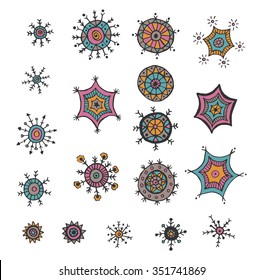 Hand drawn colorful snowflakes doodle. Tribal circular patterns. Abstract round design elements.