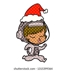 handgezeichnete Comic-Stilillustration für ein hübsches Astronautenmädchen mit Santa-Hut