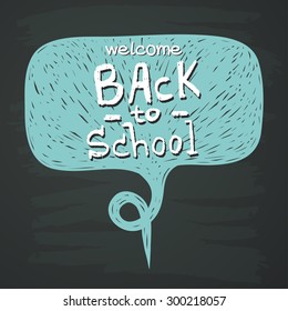 Hand drawn comic speech bubble with Back To School lettering on chalkboard background.