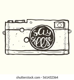 Hand drawn contour illustration of the camera with a hand lettering inscription Say Cheese