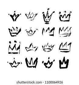 Hand drawn crown icon set in black color. Ink brush crowns background. Vector illustration EPS 10 file.