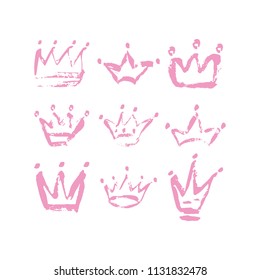 Hand drawn crown icon set in pink color. Ink brush crowns background for baby Princess. Vector illustration EPS 10 file.