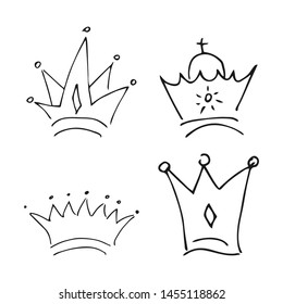 Hand drawn crowns. Set of four simple graffiti sketch queen or king crowns. Royal imperial coronation and monarch symbols. Black brush doodle isolated on white background. Vector illustration.
