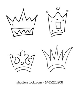 Hand drawn crowns. Set of four simple graffiti sketch queen or king crowns. Royal imperial coronation and monarch symbols. Black brush doodle isolated on white background. Vector illustration.
